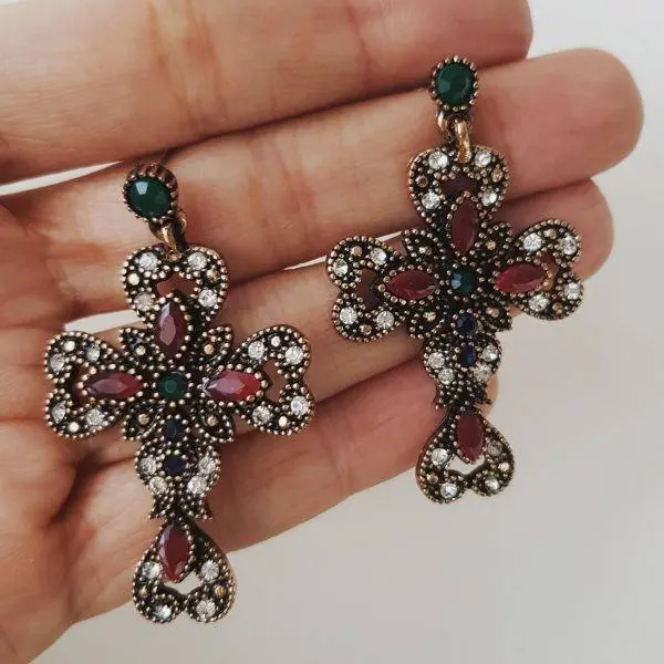 Pendientes cruz flor - Agotado -
