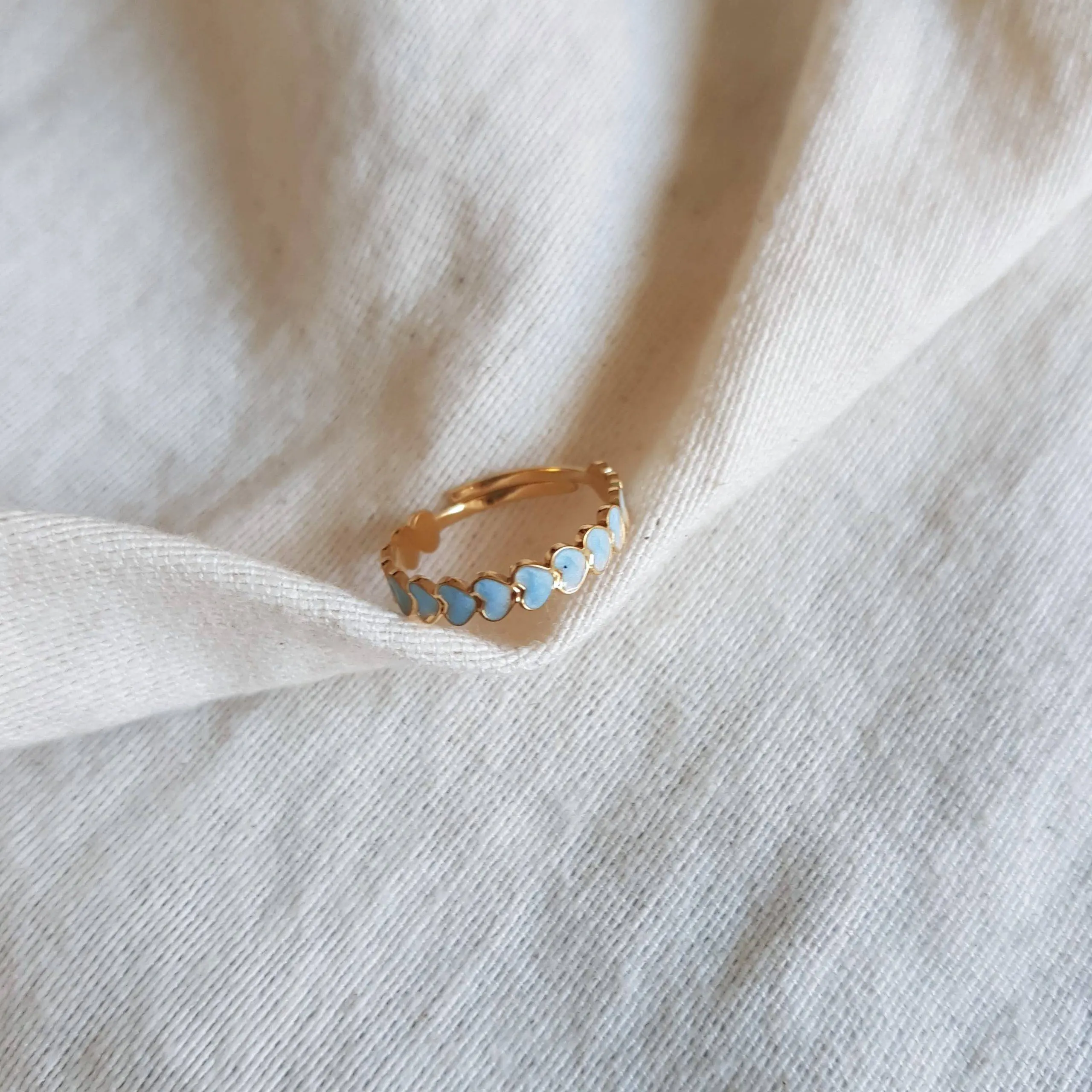 Anillo corazones turquesa