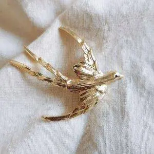 Broche golondrina gold
