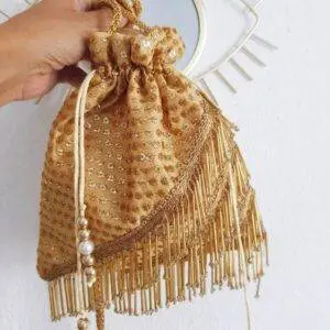 Bolsito saco flecos gold