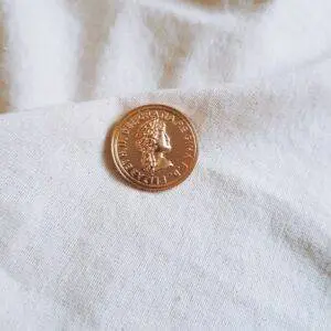 Broche moneda
