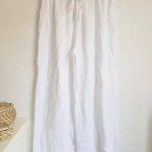 Pantalones Lino blanco flecos
