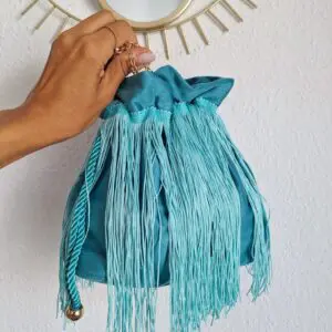 Bolso saco flecos turquesa