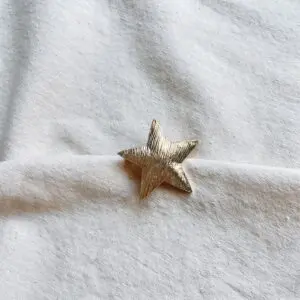 Broche estrella mina