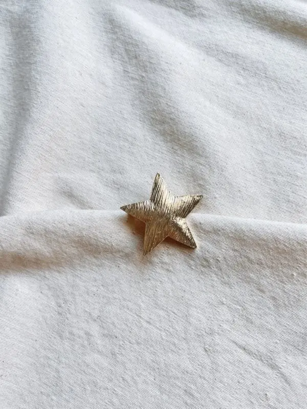 Broche estrella mina
