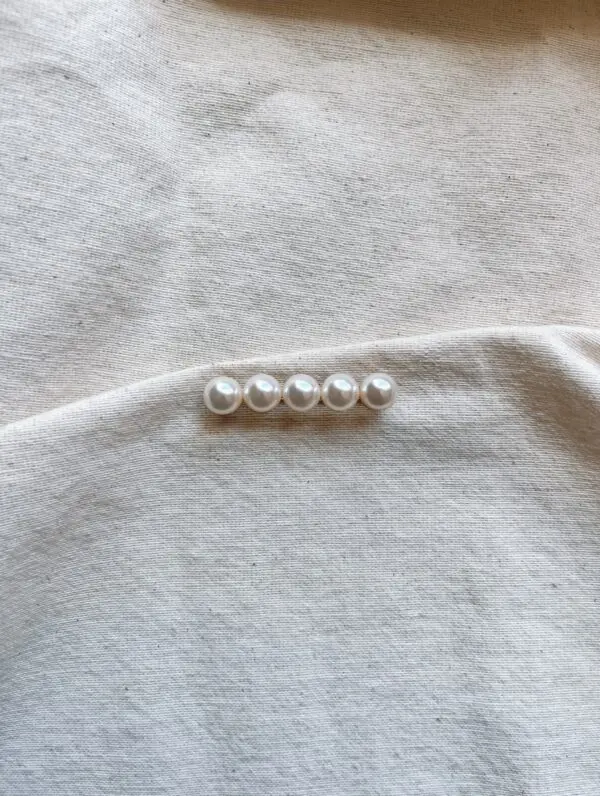 Broche perlas